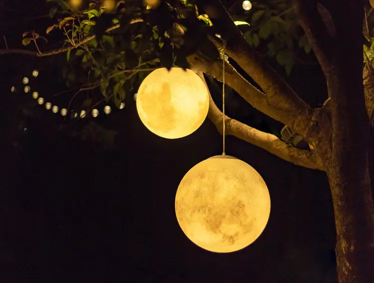 Large realistic Outdoor Moon Light glowing orb placed on modern backyard patio lawn, waterproof LED garden landscape decor light